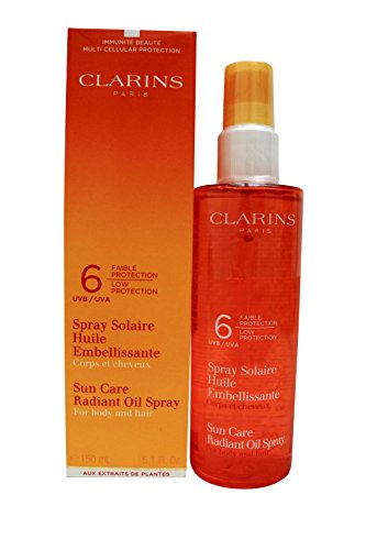 Clarins cuidado de sol aerosol radiante bajo protección de aceite para cuerpo y cabello SPF 6 para Unisex, 5,1 onzas